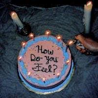 a person is cutting a cake that says how do you feel